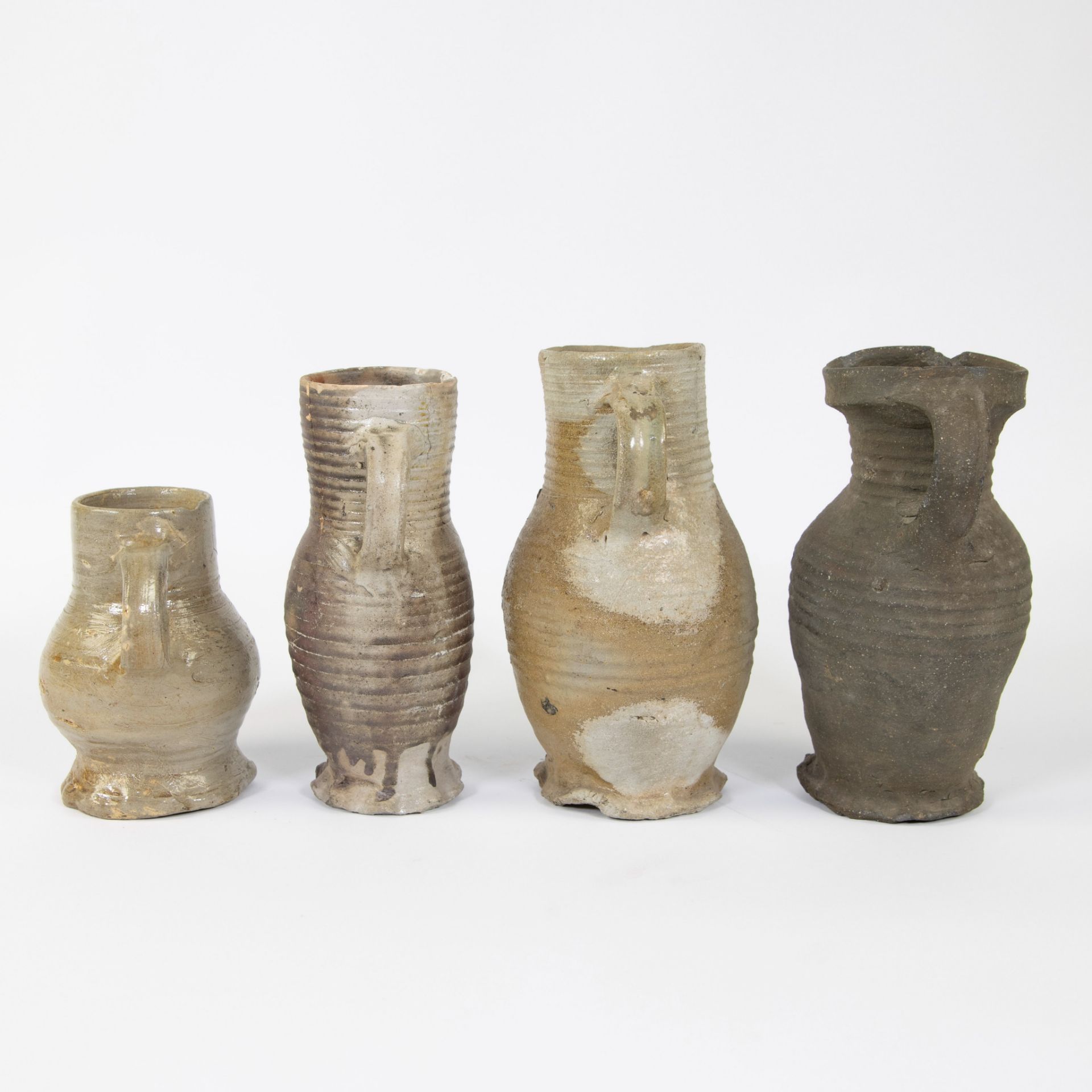 Collection of archaeological stoneware, jug Langerwald 15th, Siegburg 13th and 14th and Raeren 16th - Image 2 of 5