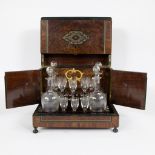 Cave a liquer in root wood and inlaid with copper, 4 crystal decanters and glasses, circa 1900