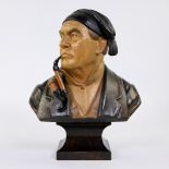 Polychrome wooden bust of a pipe-smoking man, Black Forest, signed Max Huggler.