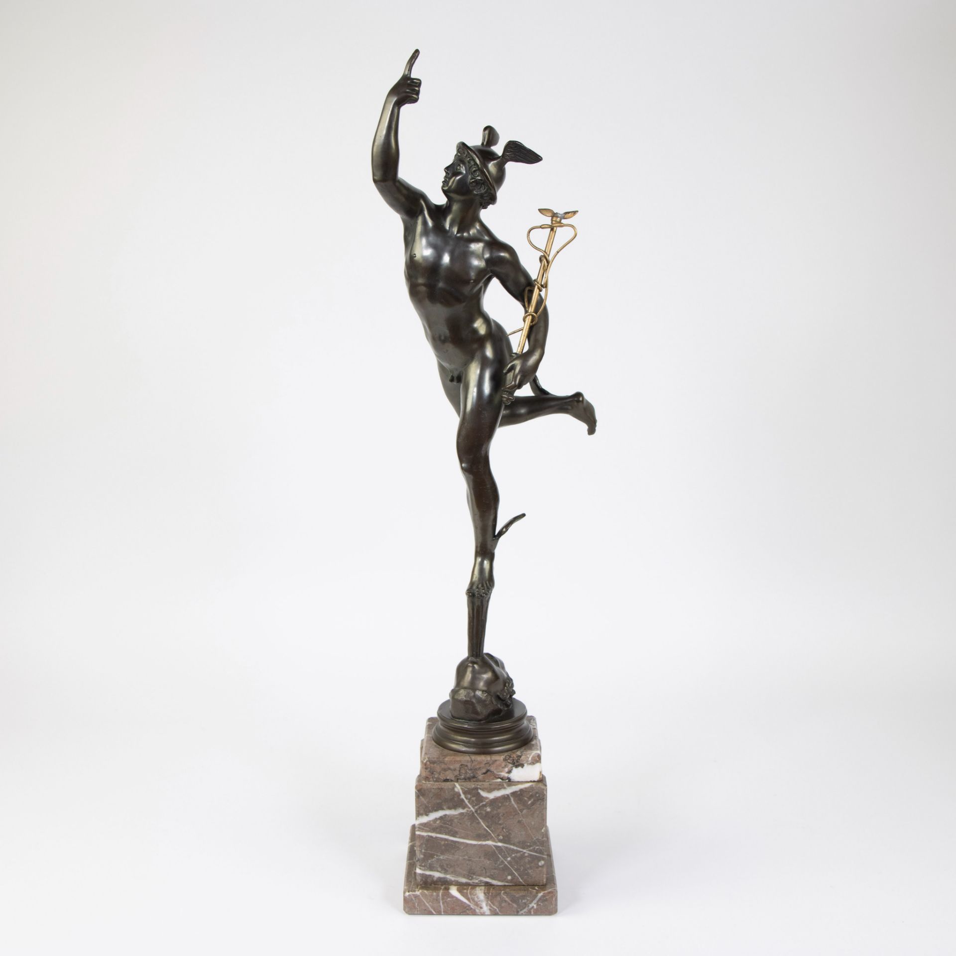 Bronze effigy of Mercury, messenger of the gods, on marble base