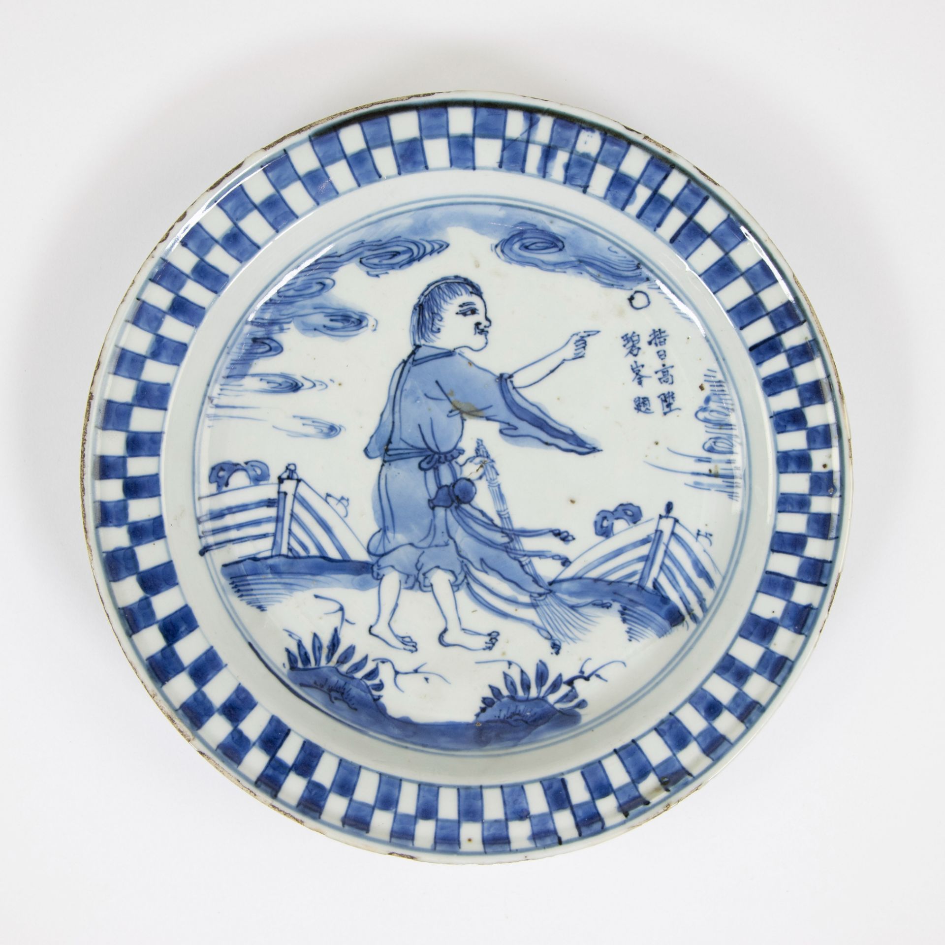 Chinese plate MING dynasty, ca 1625-1630, porcelain decorated in underglaze cobalt blue.