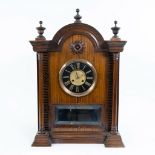 Antique music clock in wooden case with music rolls, signed W. Kimbler Crouch End