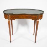 Large kidney-shaped table with drawer, raised edge in brass and green leaf in imitation leather