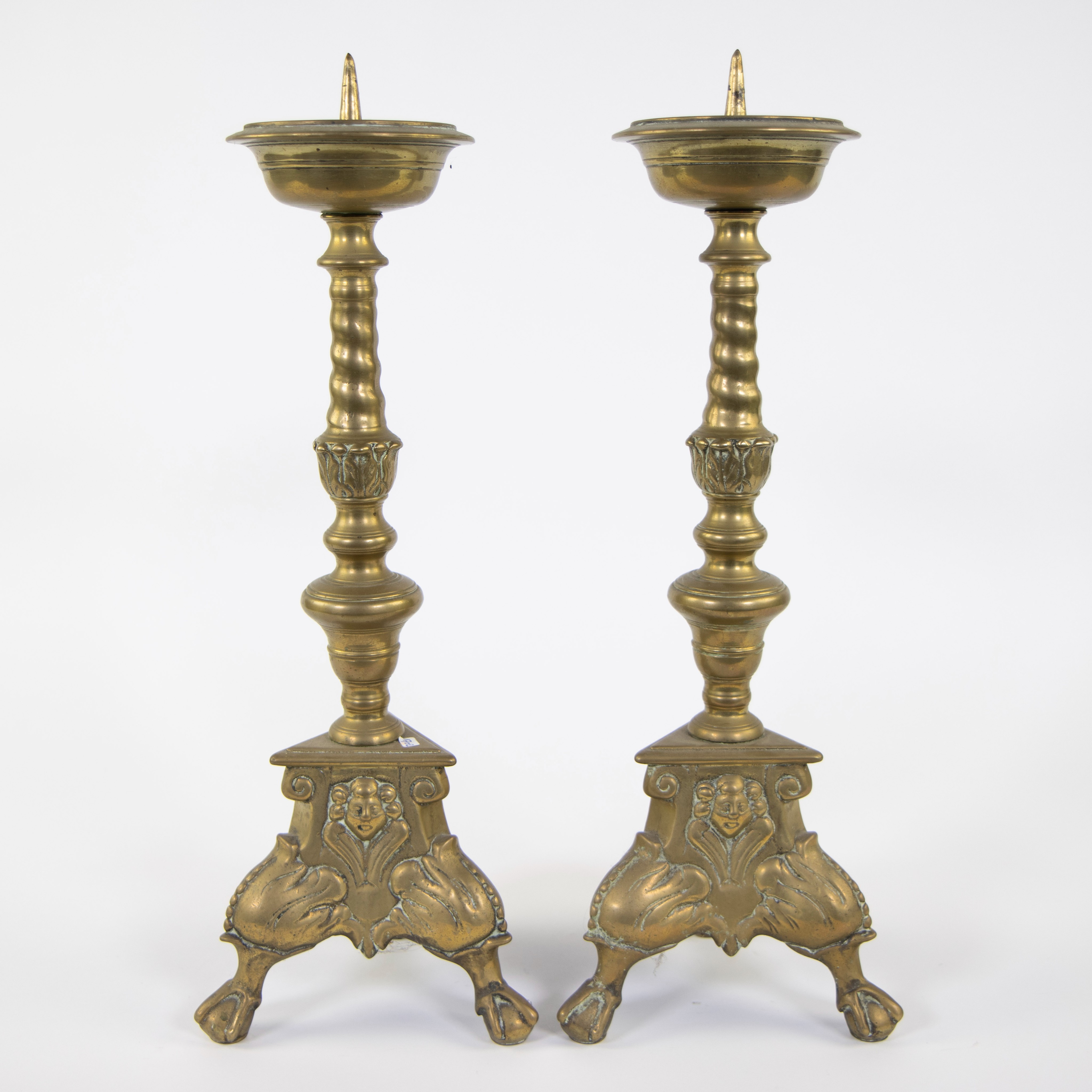 Pair of brass candlesticks decorated with cherub heads, Renaissance, 17th century - Image 2 of 4