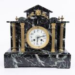 Napoleon III style mantel clock in black veined marble in the shape of a pantheon including 2 column