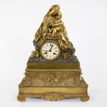 Gilt bronze Louis Philippe mantel clock with mother and child decor, Paris 19th century