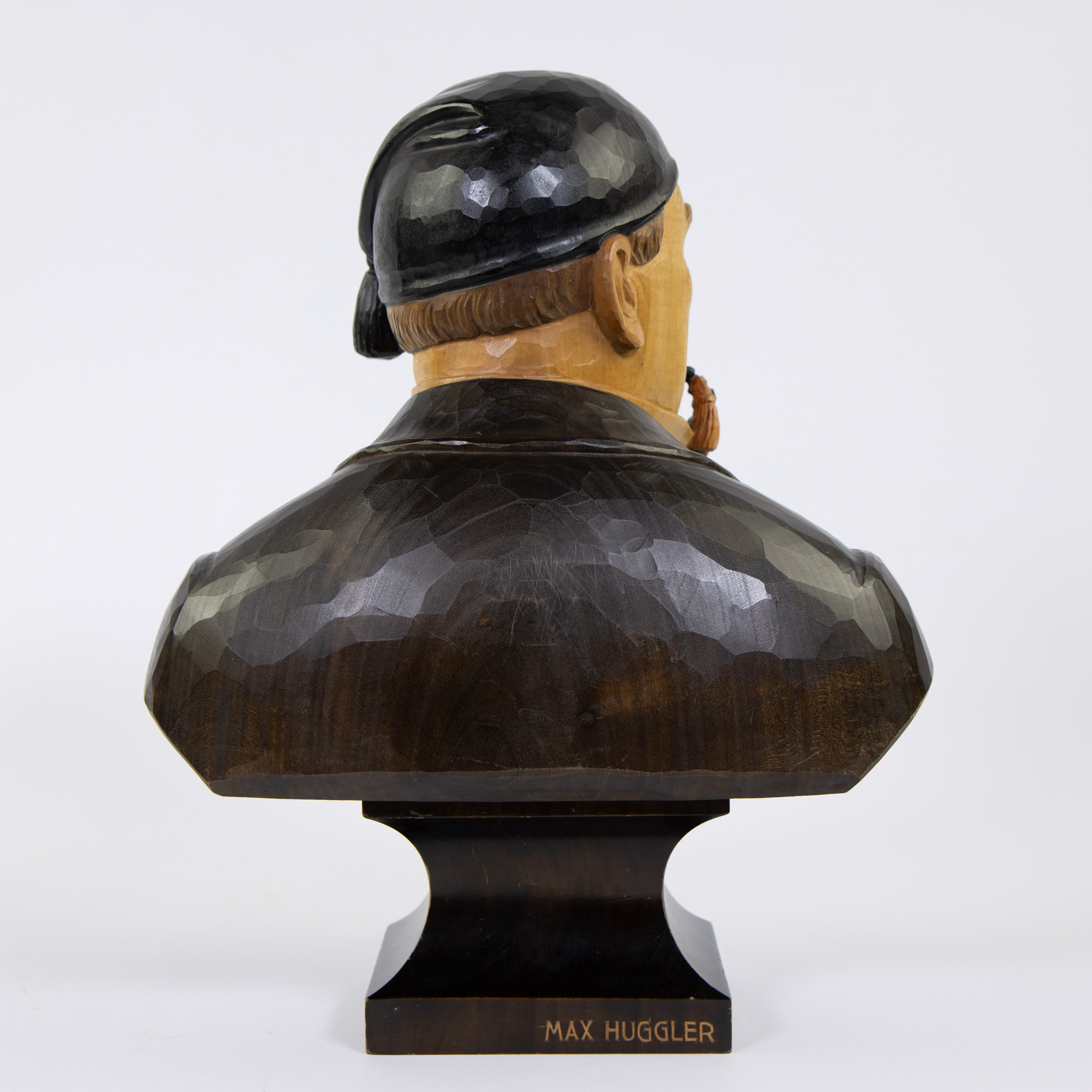 Polychrome wooden bust of a pipe-smoking man, Black Forest, signed Max Huggler. - Image 3 of 5