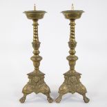 Pair of brass candlesticks decorated with cherub heads, Renaissance, 17th century