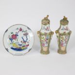 A pair of Cantonese lidded vases and a Chinese plate