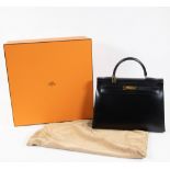 HERMES handbag Kelly 35 in black box calf 1990s, with original box and storage bag