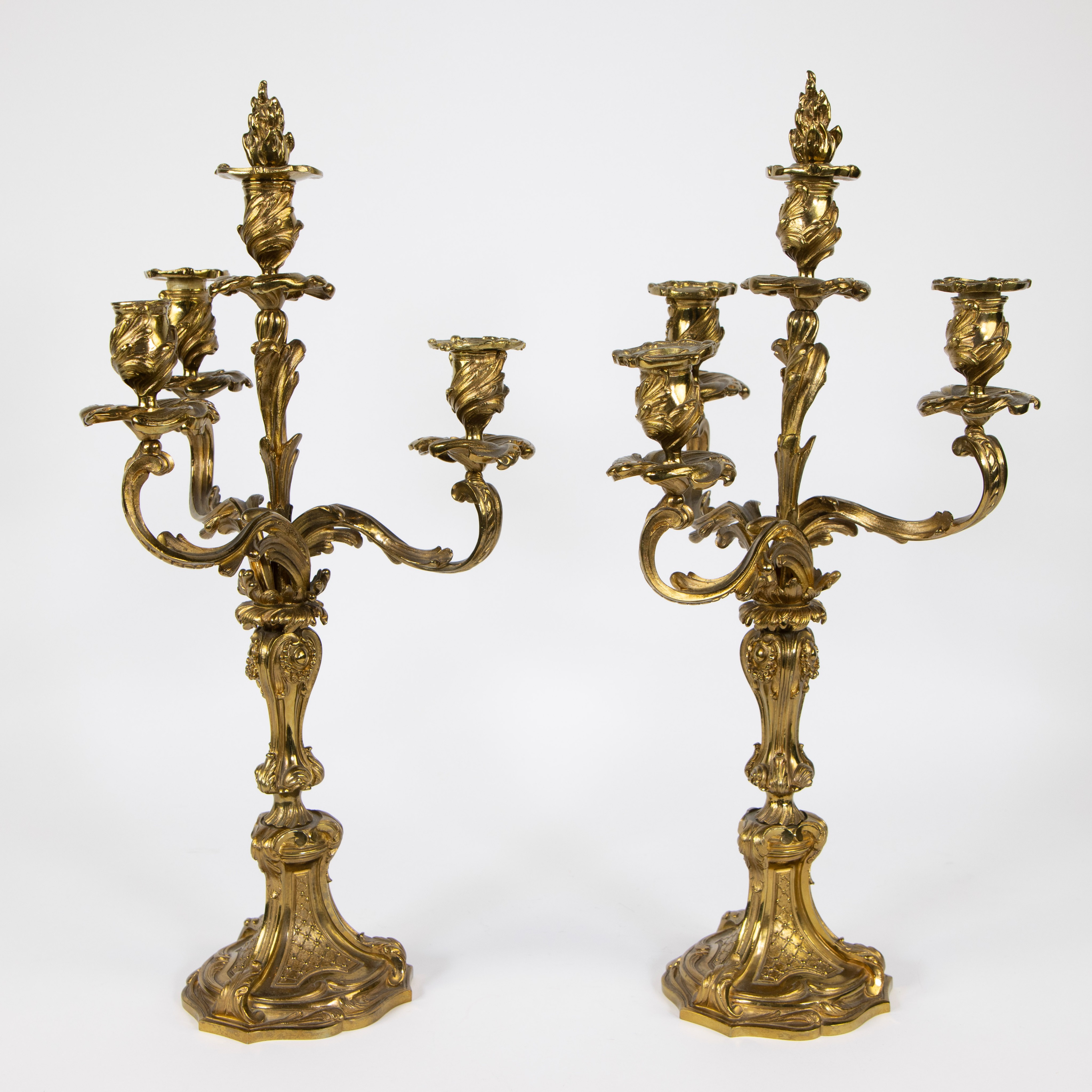 A pair of French gilt bronze Louis XV style four-light candlesticks, 19th/20th C. - Image 2 of 4