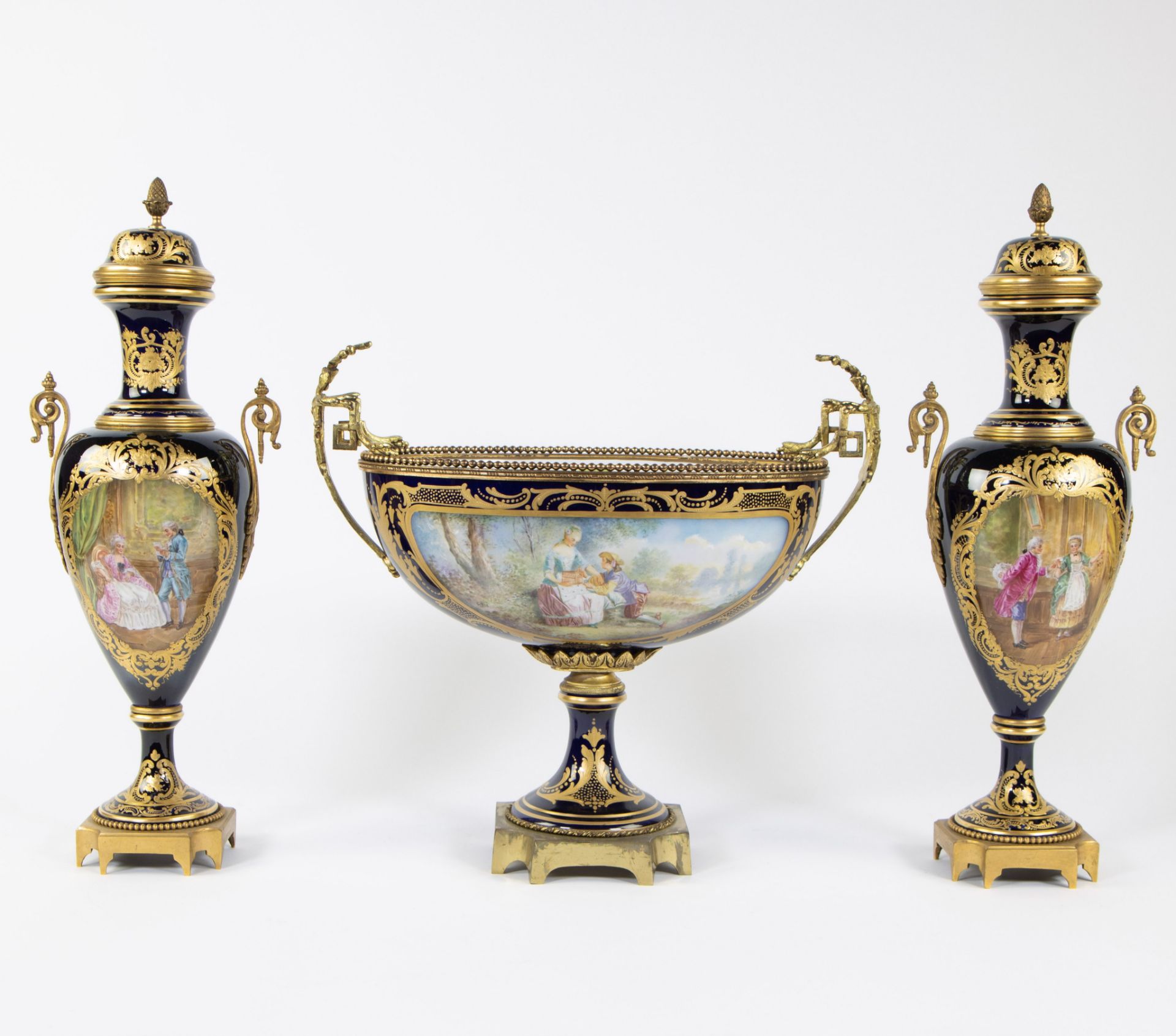 A three-part garnish with bronze mounts in Sèvres porcelain, France, marked