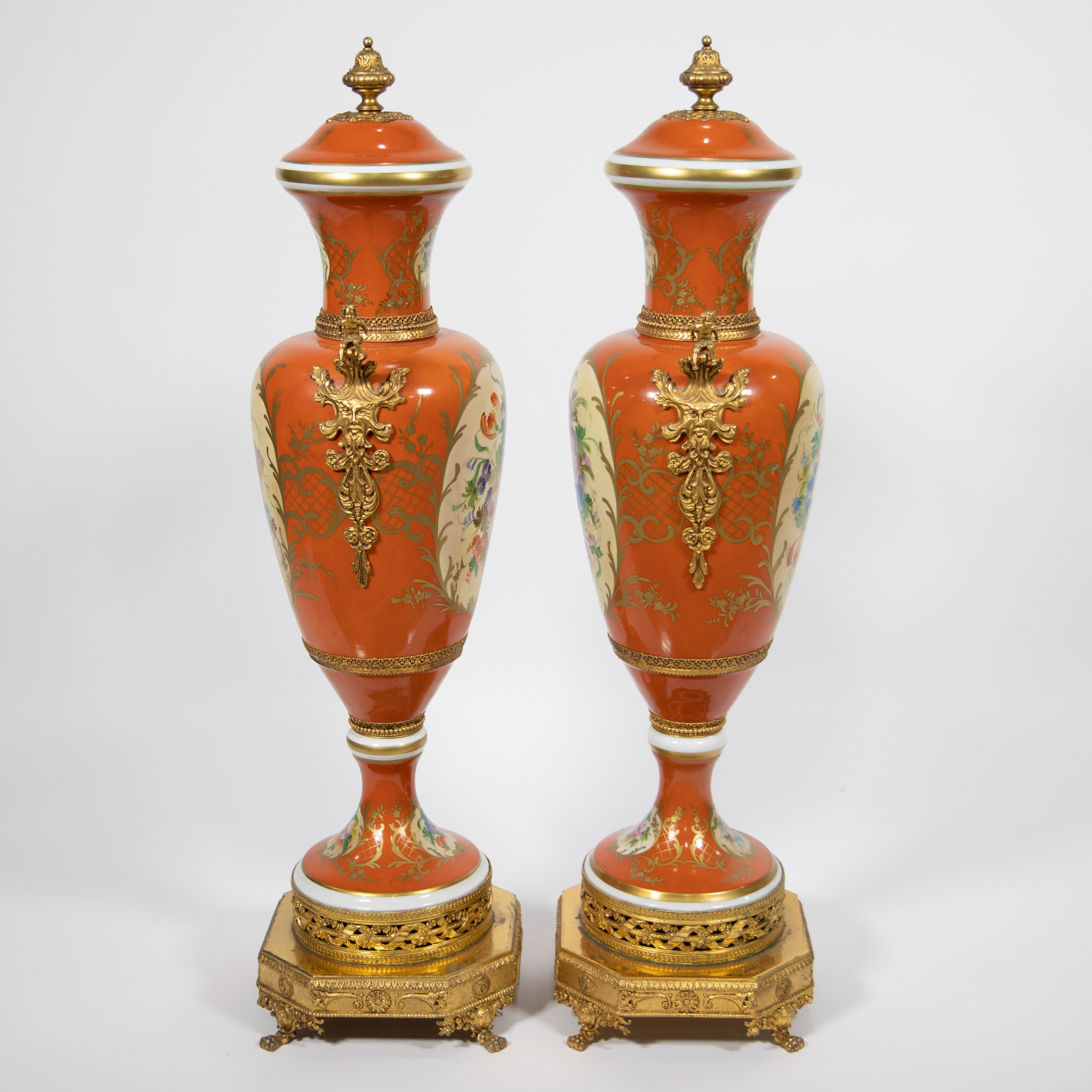 A pair of orange and polychrome porcelain covered vases with flowers and gilt bronze base and orname - Image 4 of 4