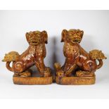 Pair of Vietnamese Foo dogs in glazed earthenware