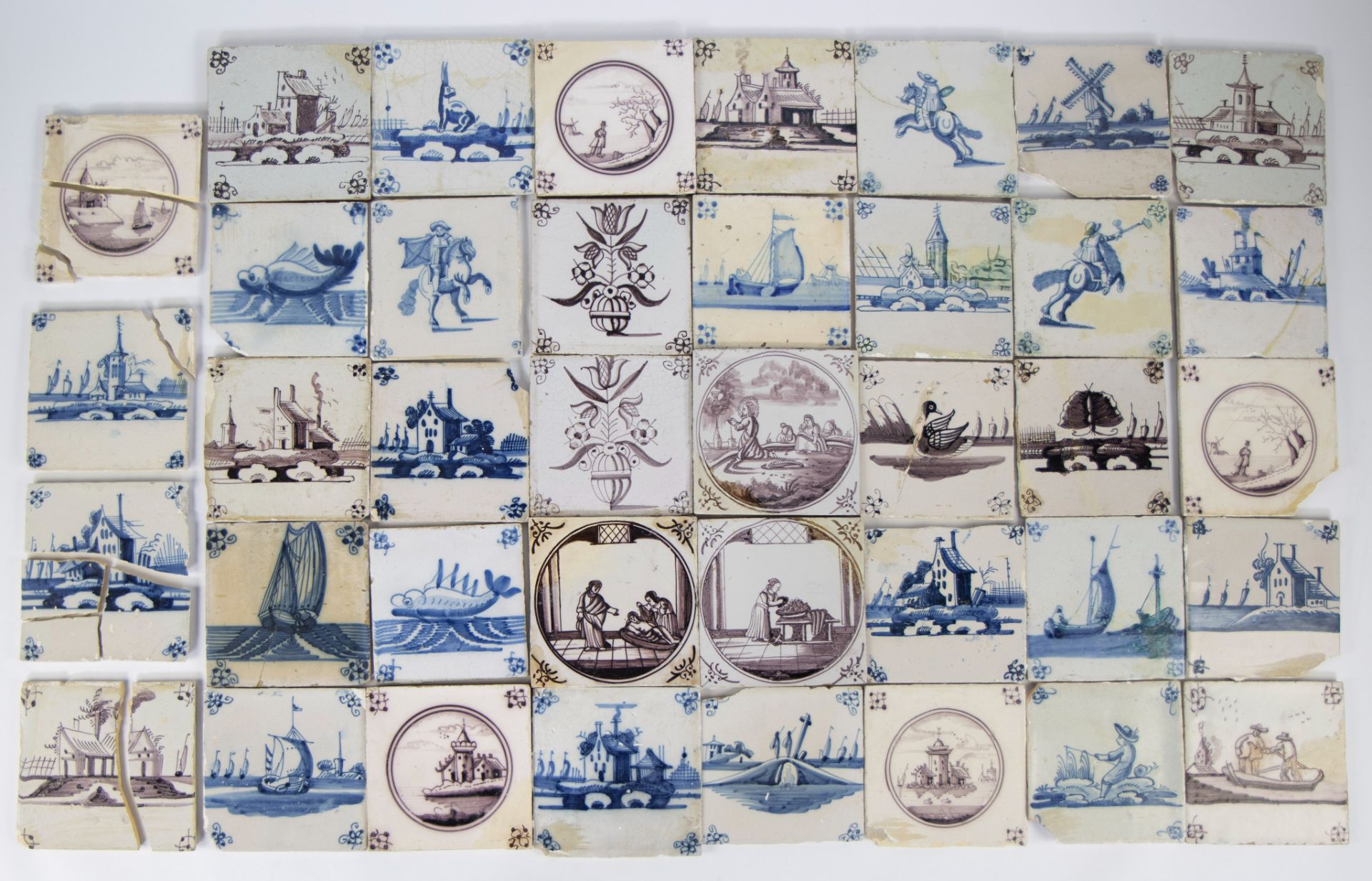 Large lot of manganese and blue/white Delft tiles, 18th/19th century