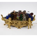 Center piece in bronze doré filled with bunches of grapes in colored crystal (with lighting), circa