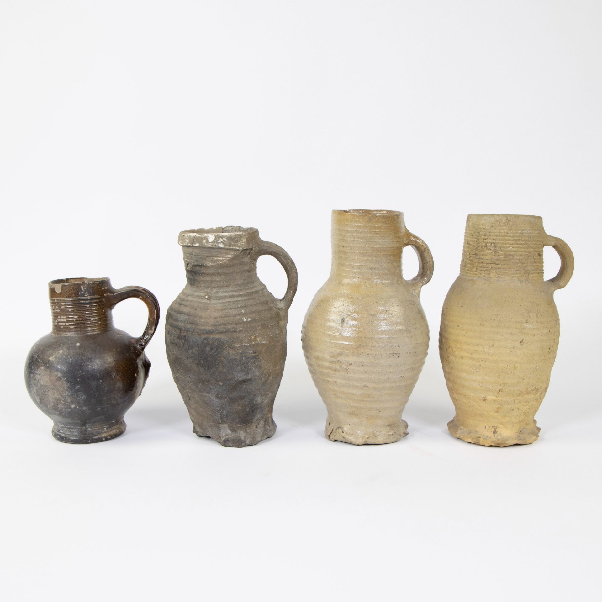 Collection of archaeological stoneware 13th to 15th century, oa jug Siegburg 13th and 14th century