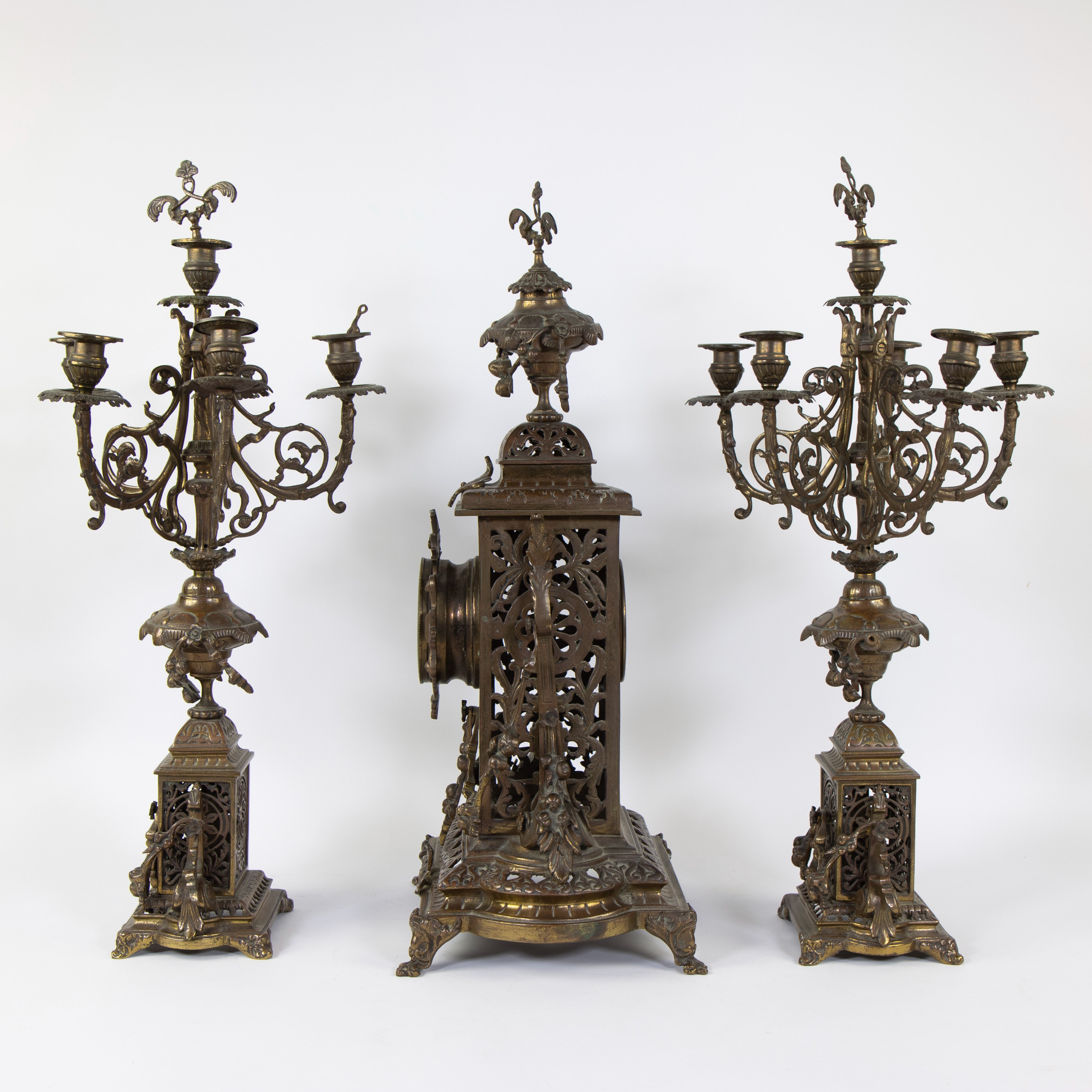 A Napoleon III style brass clock set comprising a mantel clock and two candlesticks. - Image 2 of 4