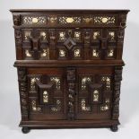 Dutch Rennaisance column cabinet with beautiful carvings of twisted columns, cobblestones, figures a