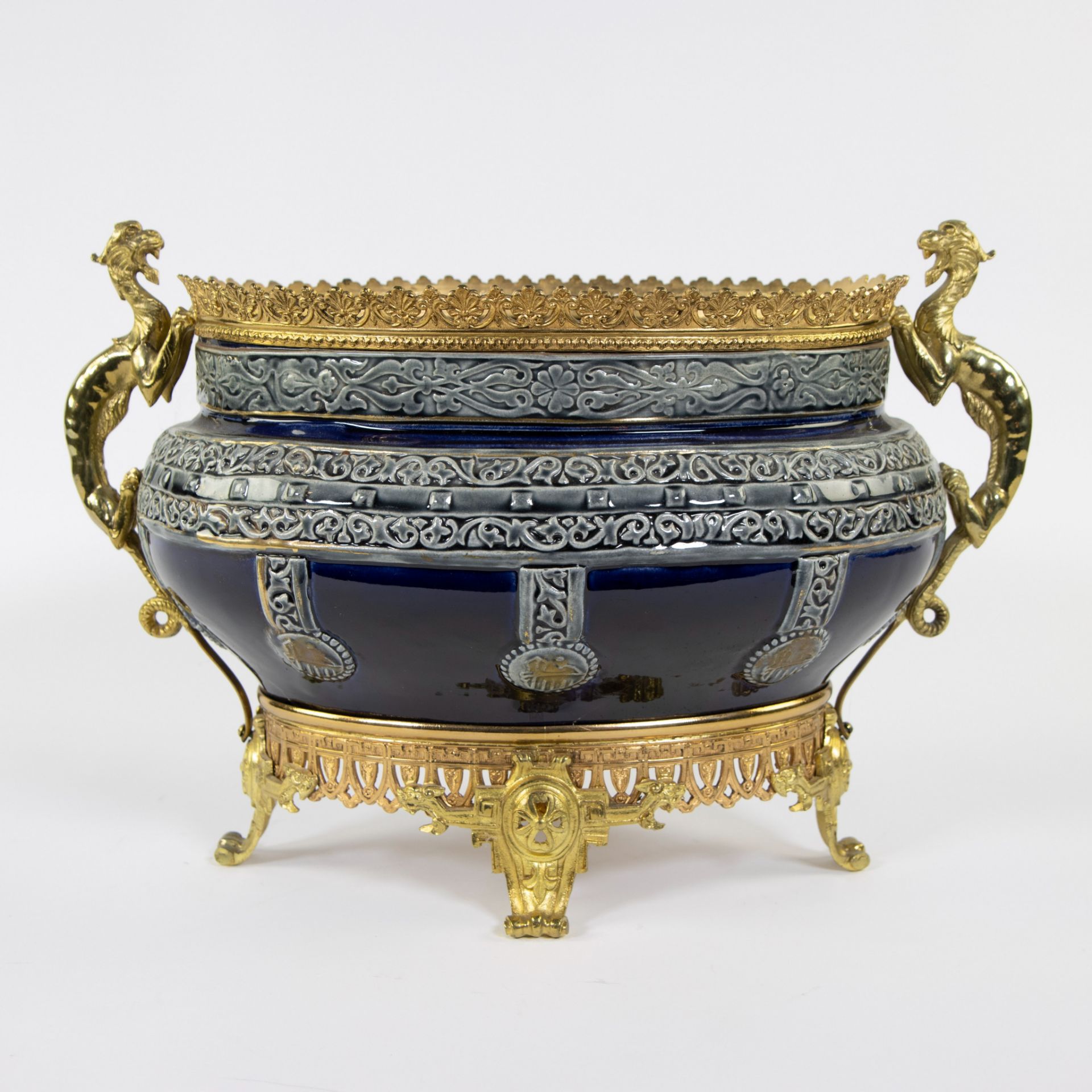 Exceptional and rare polychrome jardinière with gold-plated fittings and handles shaped as dragons. 