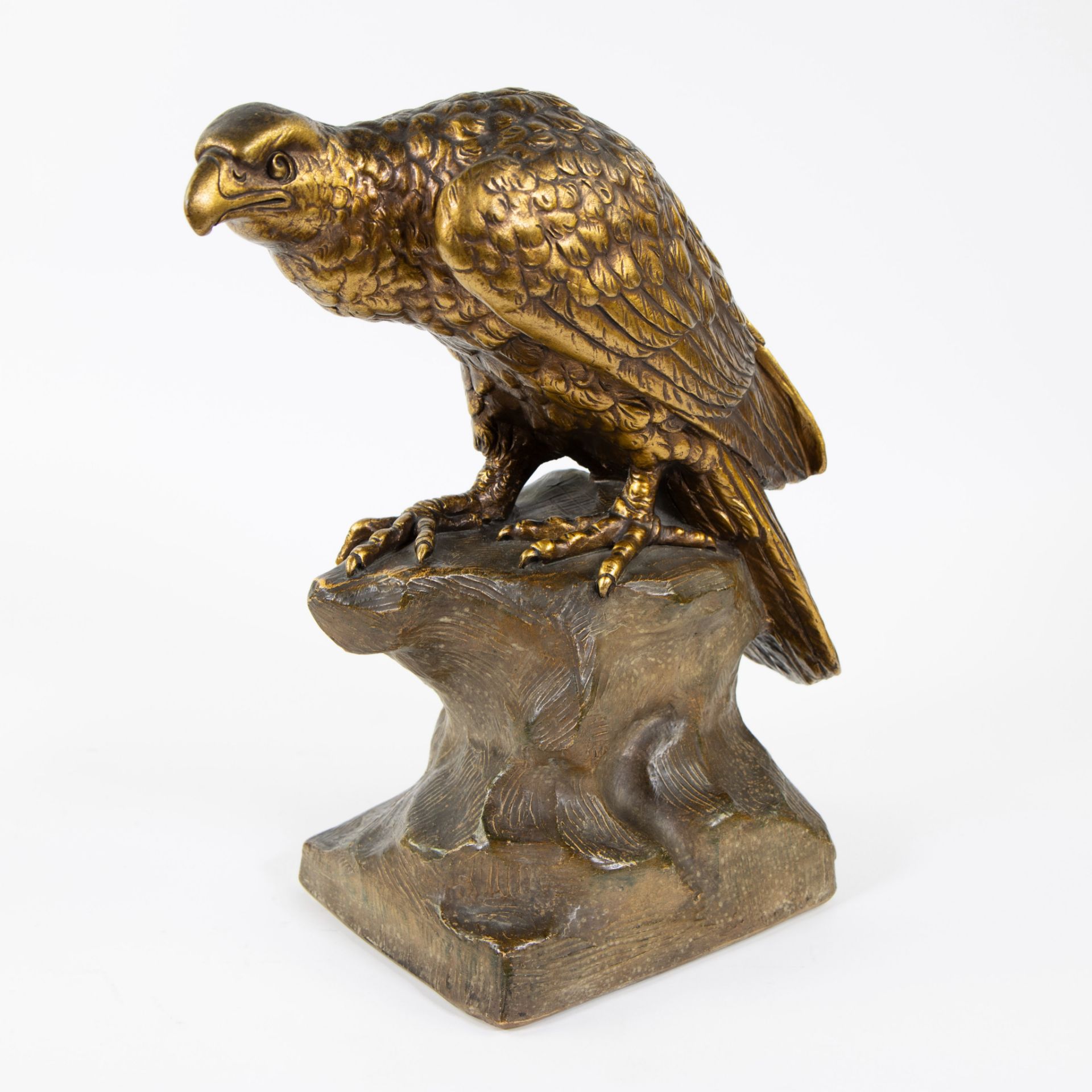 Gilded patinated plaster of an eagle. Illegeable signed.