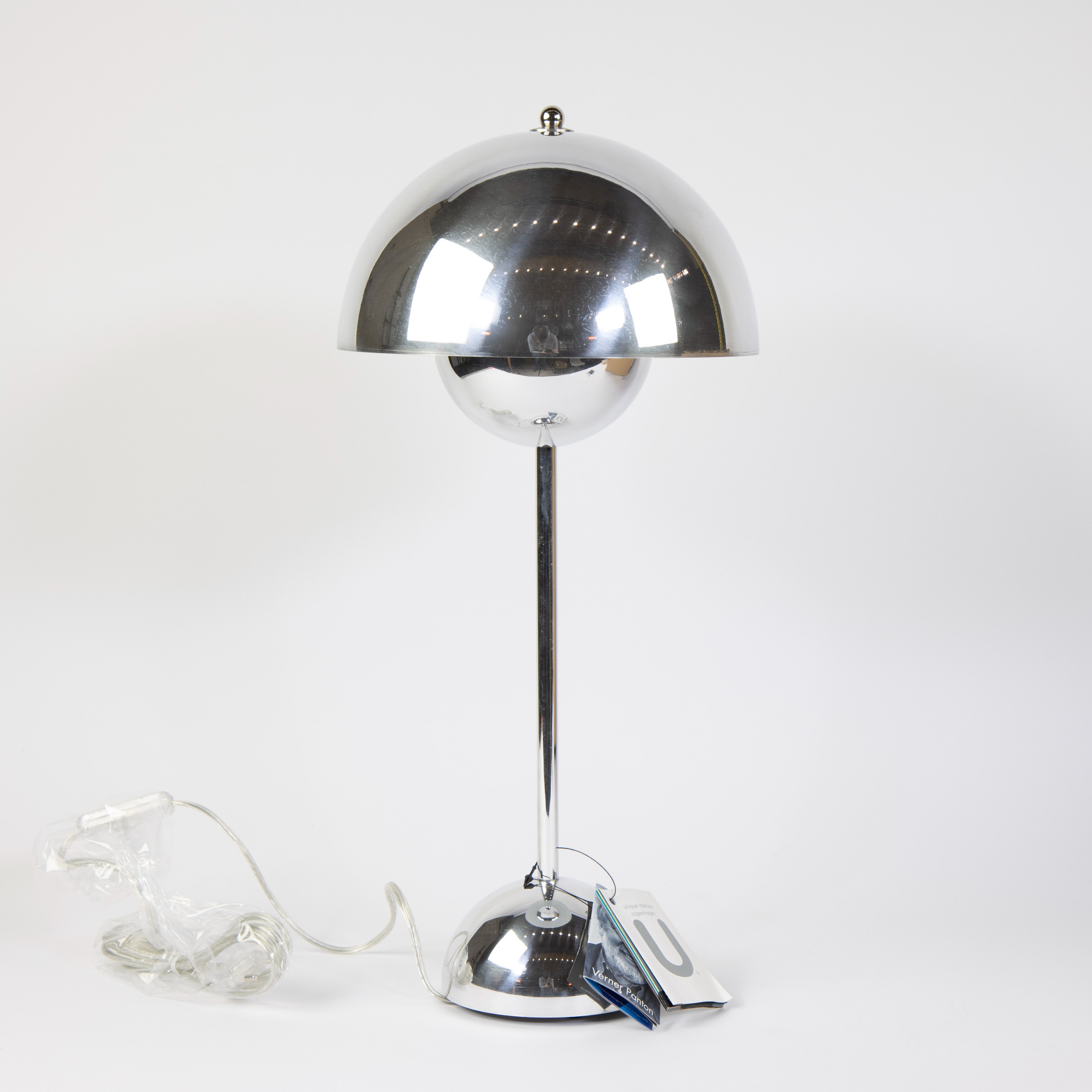 A Flowerpot lamp in chromed steel. Design by Verner Panton . Limited edition Unique Interieur Copenh