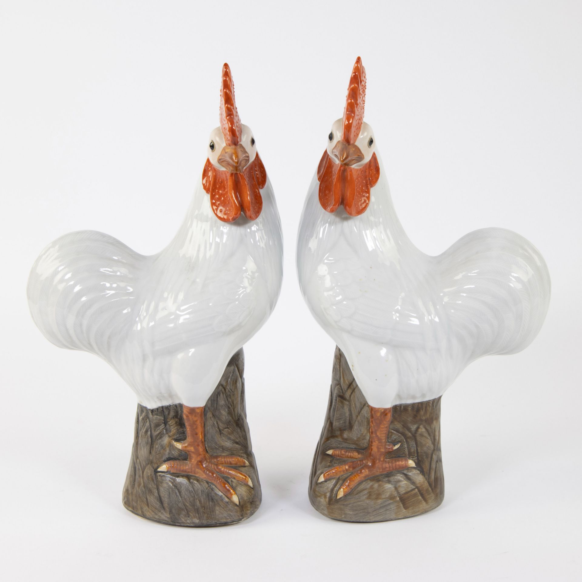 Pair of Chinese roosters in white ceramics, 20th century