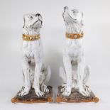 Pair of large white dogs in glazed ceramic