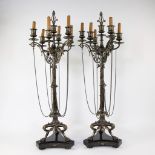 Two large rare 19th century 7-light candlesticks with hanging chains, standing on claw feet and with