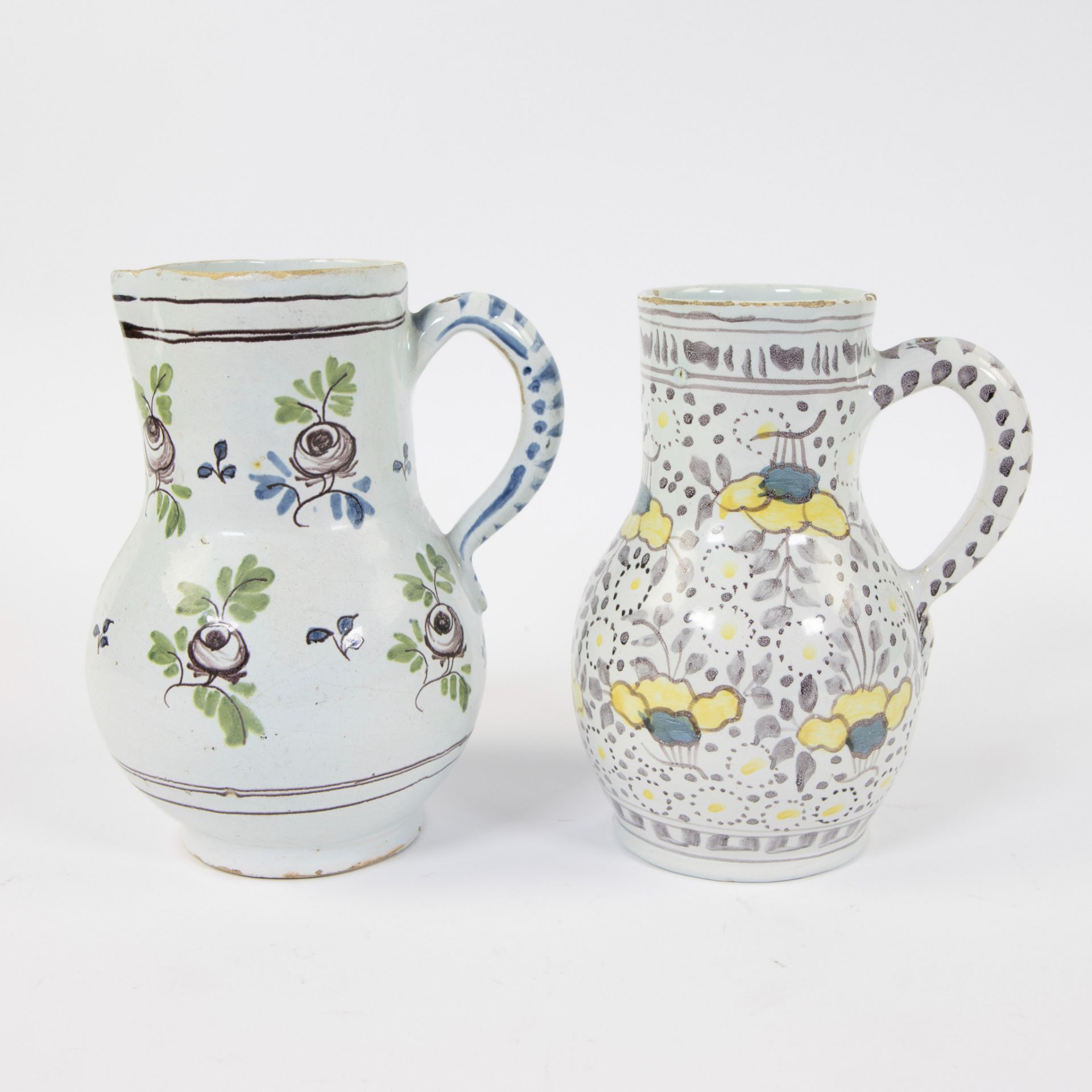 2 jugs with polychromy in faience 18th century