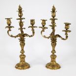 A pair of French gilt bronze Louis XV style four-light candlesticks, 19th/20th C.