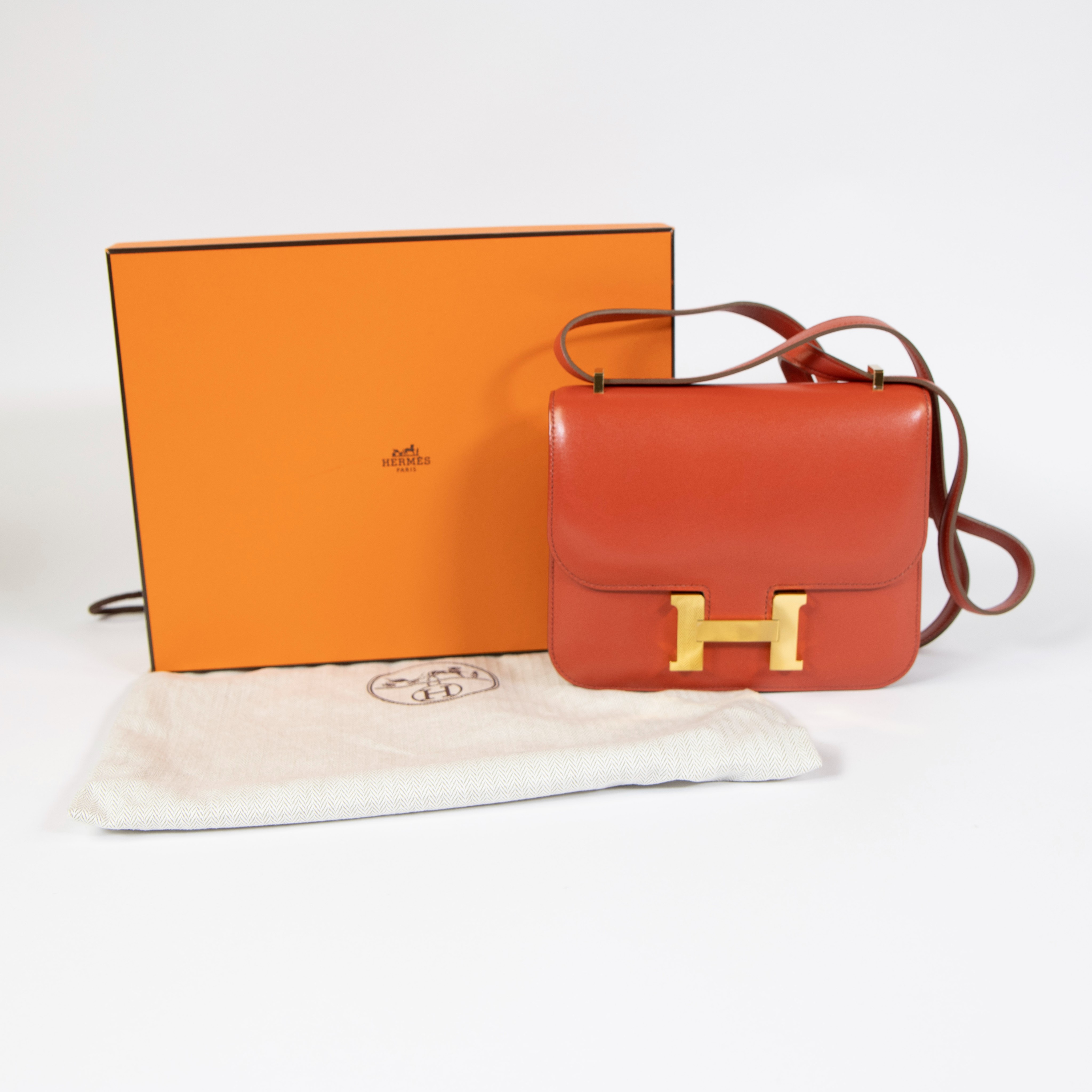 Hermes leather handback model Constance coral color with original bag and box