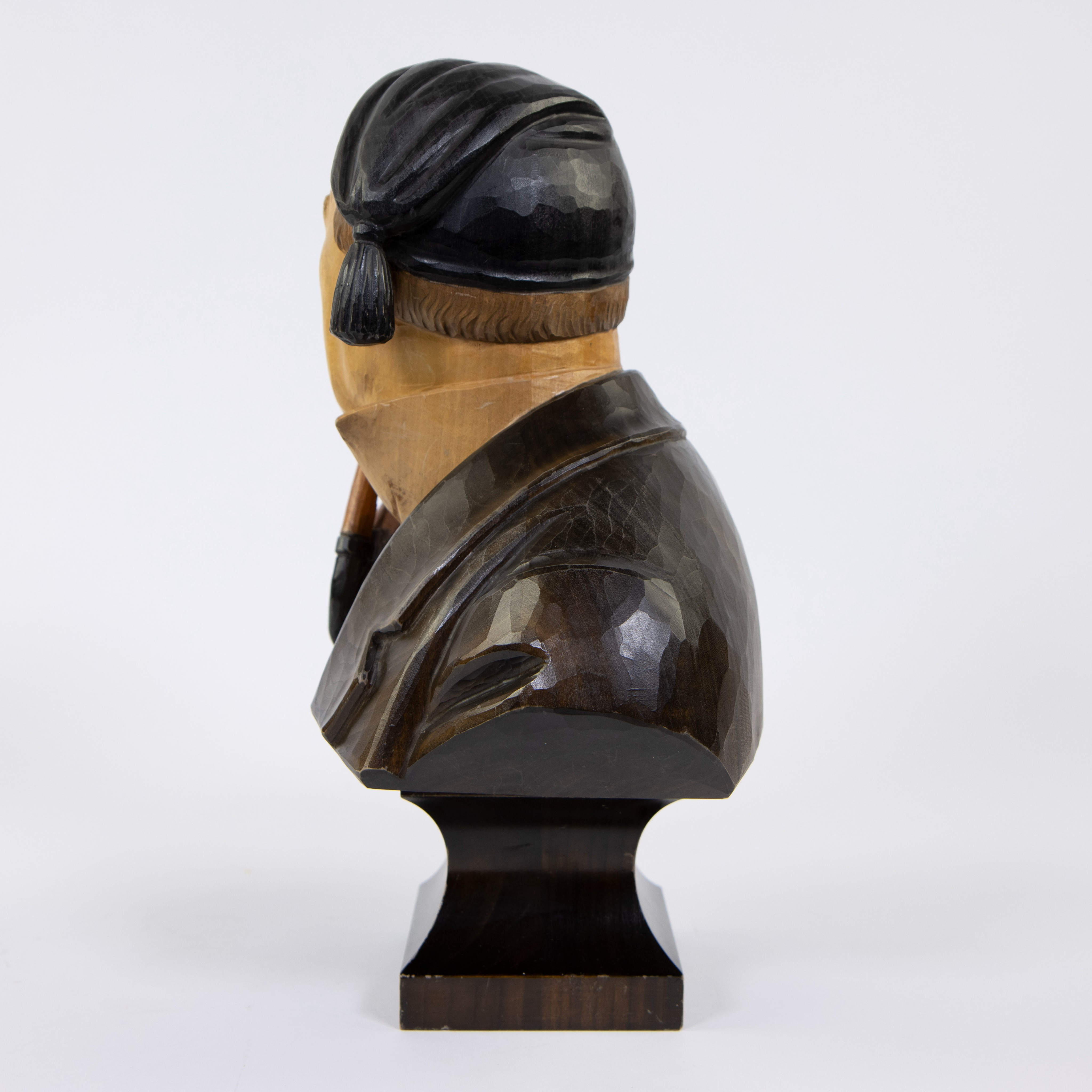 Polychrome wooden bust of a pipe-smoking man, Black Forest, signed Max Huggler. - Image 2 of 5