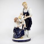 Large Royal Dux porcelain statue of father, mother and child, marked and stamped