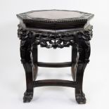 Chinese pied de stalle decorated with dragon heads, garlands and marble top