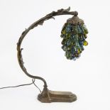 Art Deco table lamp in bronze decorated with leaves and shade in the shape of a bunch of grapes