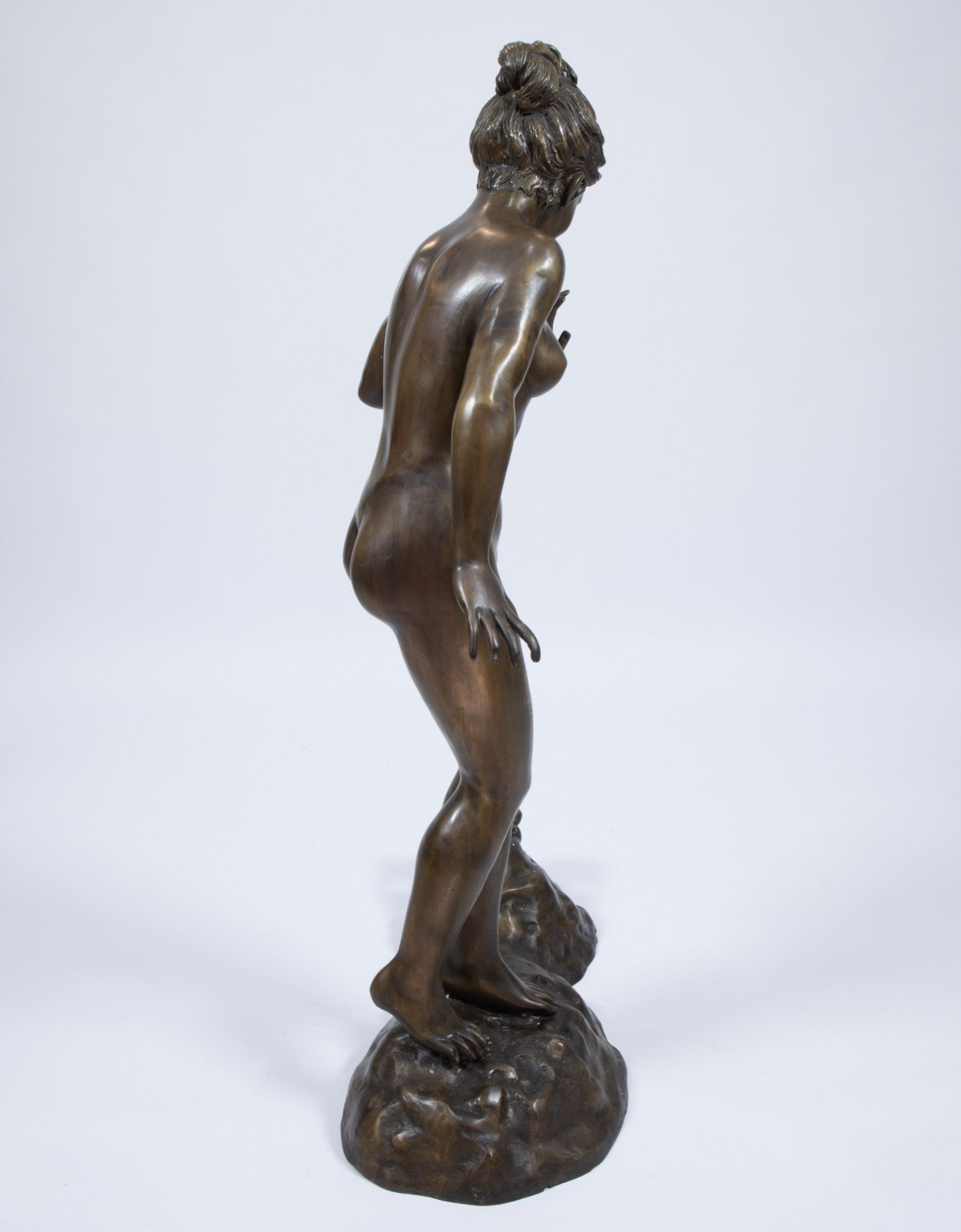 Exceptionally large brown patinated statue of nude woman with frog - Image 2 of 4