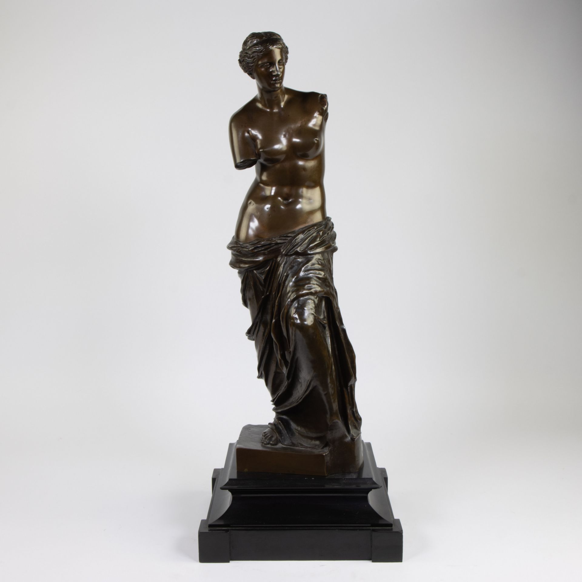 Large bronze sculpture Venus of Milo on black marble base