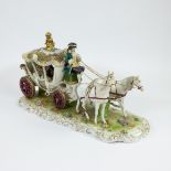 A horse-drawn carriage in polychrome porcelain Germany, marked GDR (Germany democratic Republic)