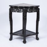 Finely sculpted Chinese corner console with marble top