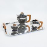 An Art Deco silver-plate four-piece tea set Christofle designed in the 1930s by Christian Fjerdingst