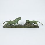 Green patinated bronze Bengal tigers, signed