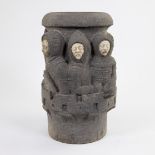 19th century sculpture of a tower with soldiers in lava rock and with marble faces after medieval mo