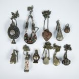 Large collection of silver and silver-plated Asian perfume bottles