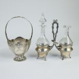 Collection of a silver oil and vinegar set and silver basket with crystal coupe