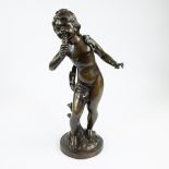 Brown patinated bronze statue of child with an ice cream cone