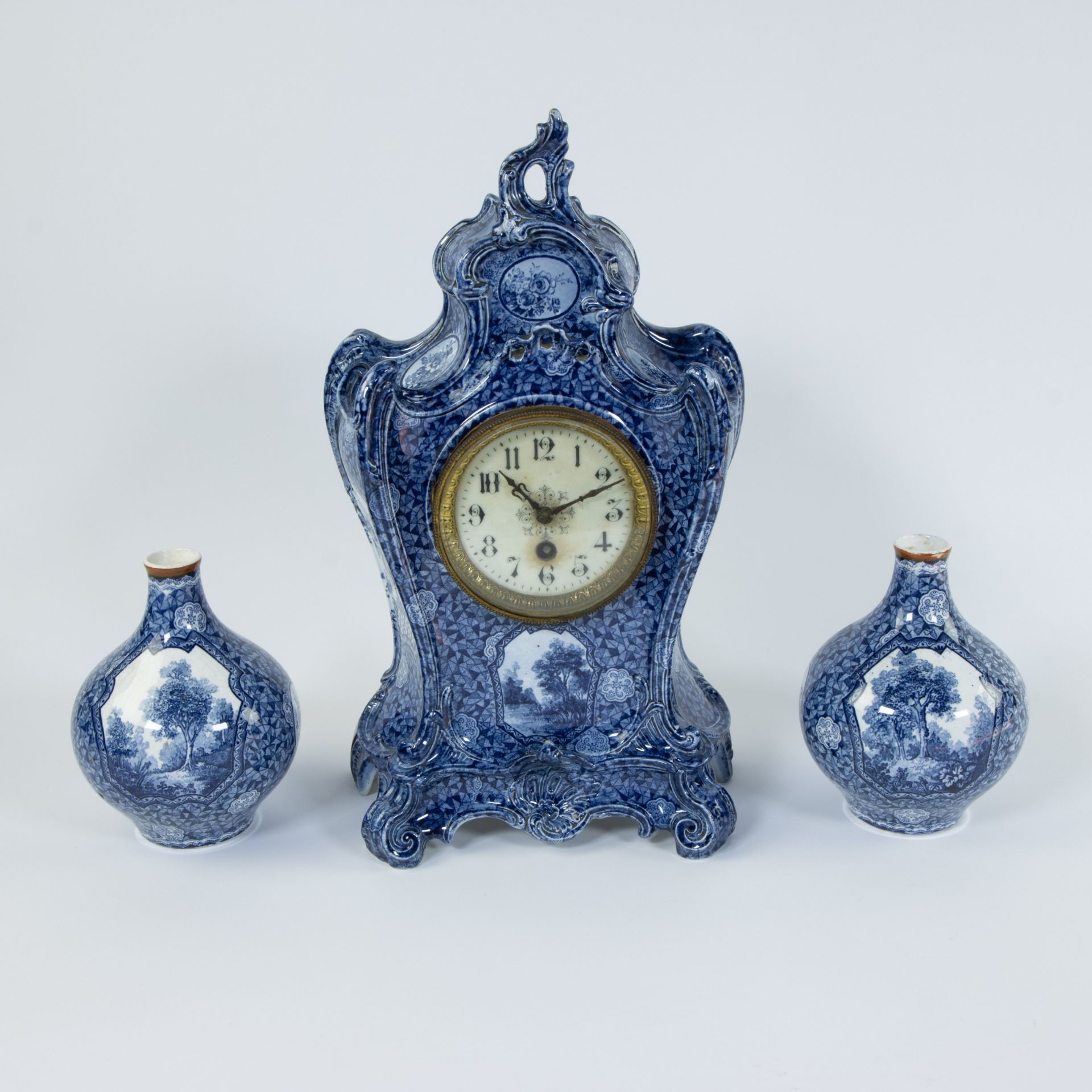 Franz Anton Mehlem, Bonn Germany - clock with 2 vases, Flamand decor, circa 1920