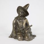 Arthur PUYT (1873-1955), silvered bronze statue A seated pierrot with champagne bottle, signed.
