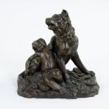 Bronze statue of a dog with child, signed