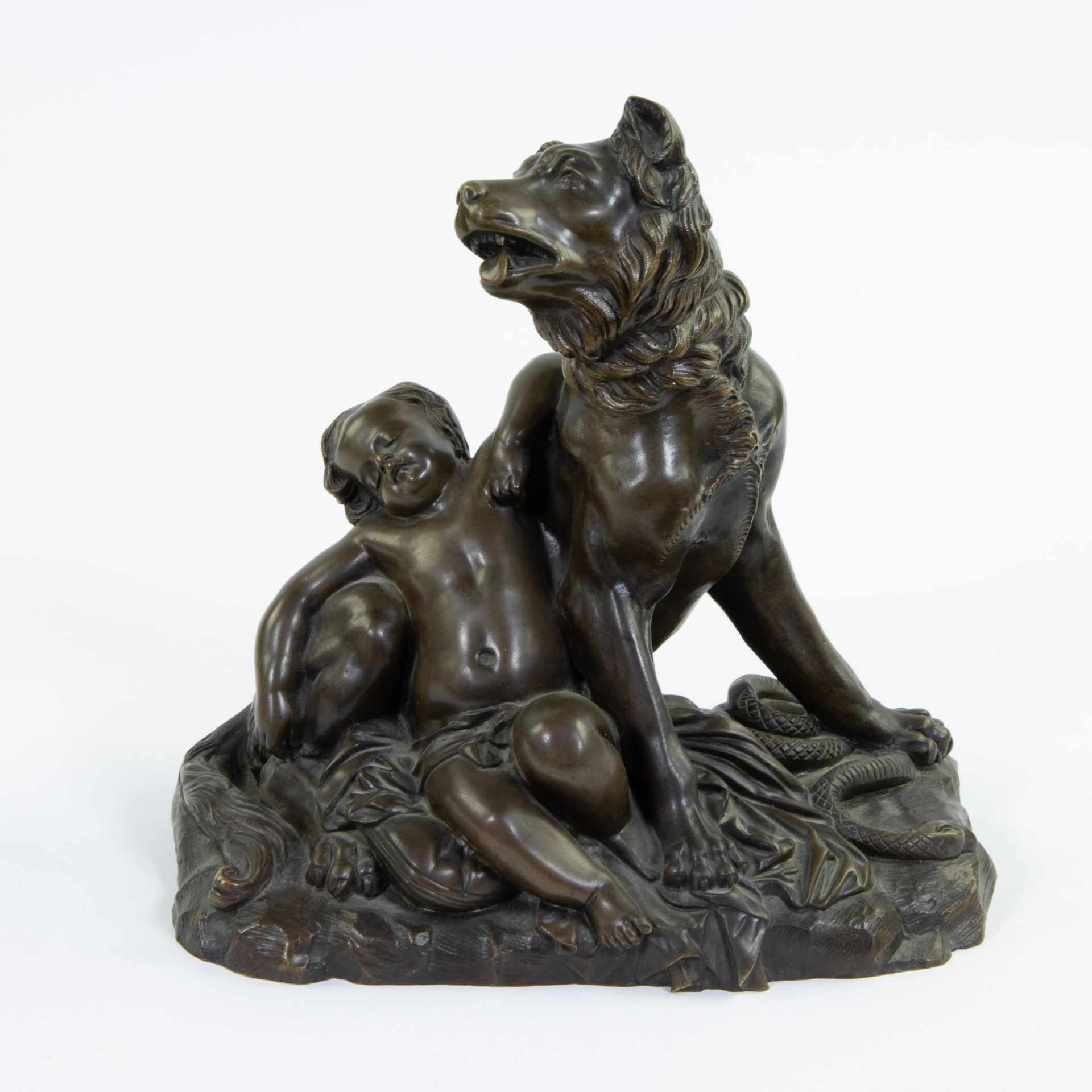 Bronze statue of a dog with child, signed